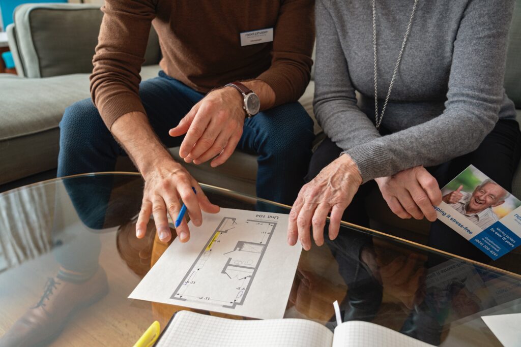 Professional senior relocation specialist conducting a move planning consultation in North Vancouver.