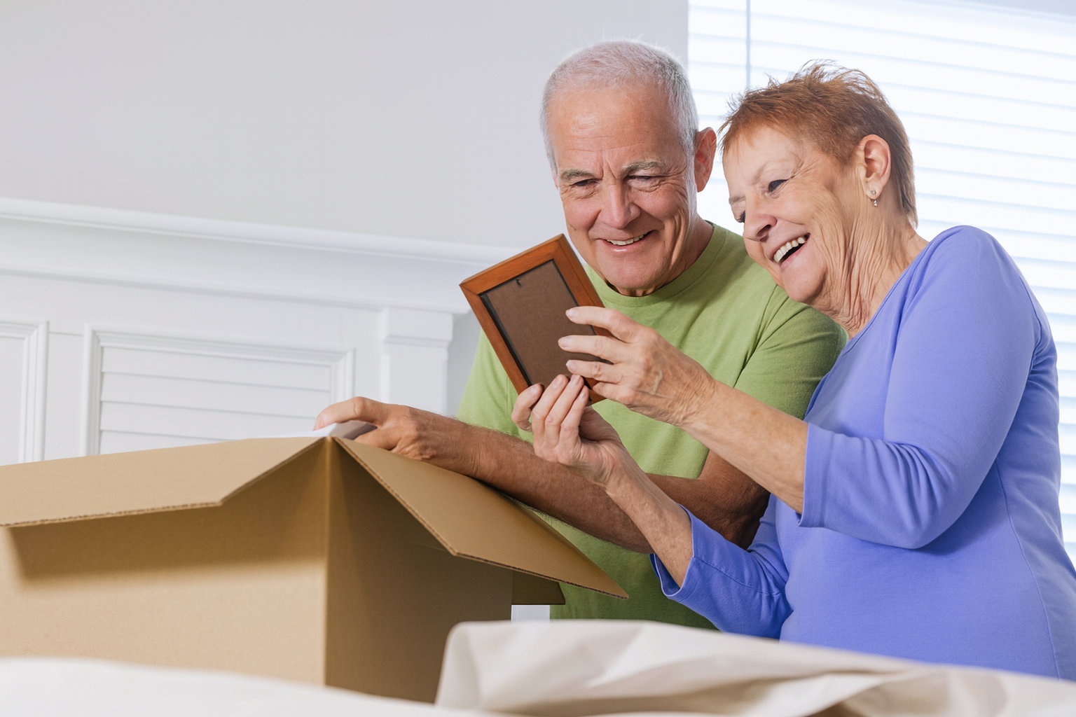 Seniors downsizing Greater Vancouver, packing memories together.
