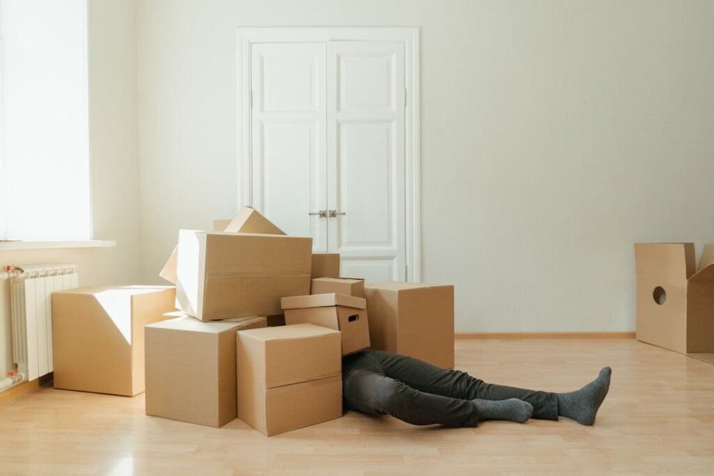 A professional NextPhase downsizing specialist in North Vancouver organizing household items and coordinating donations for a senior home transition.