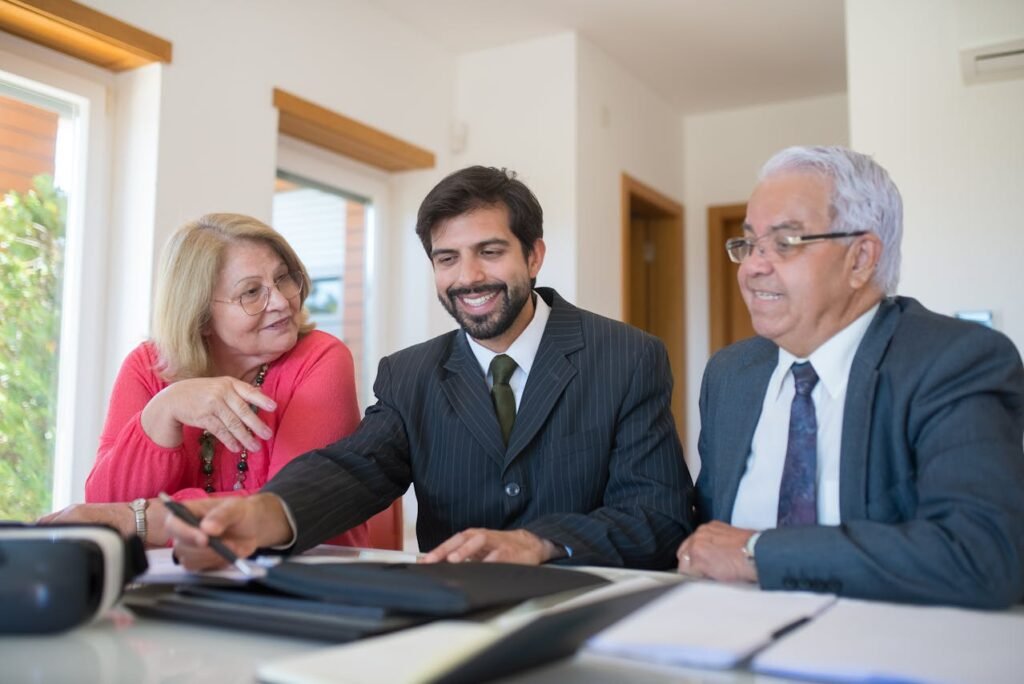 Professional senior downsizing specialist in North Vancouver helping a client sort through household belongings with care.